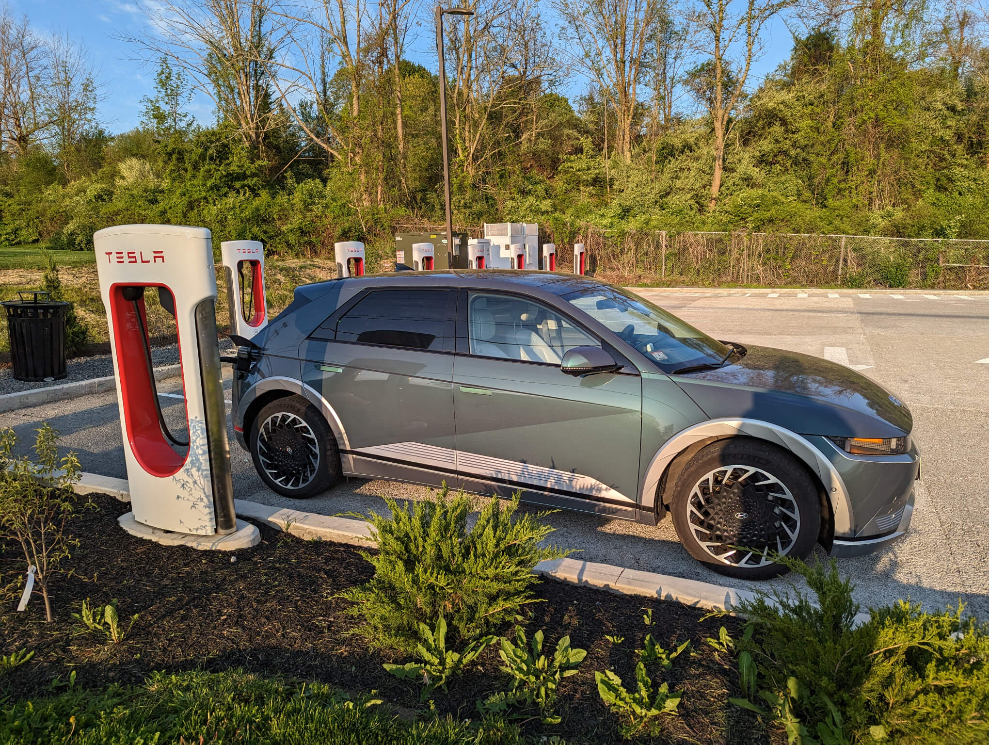 Hyundai IONIQ 5 charges at a Tesla Supercharger with Magic Dock in Brewster, NY