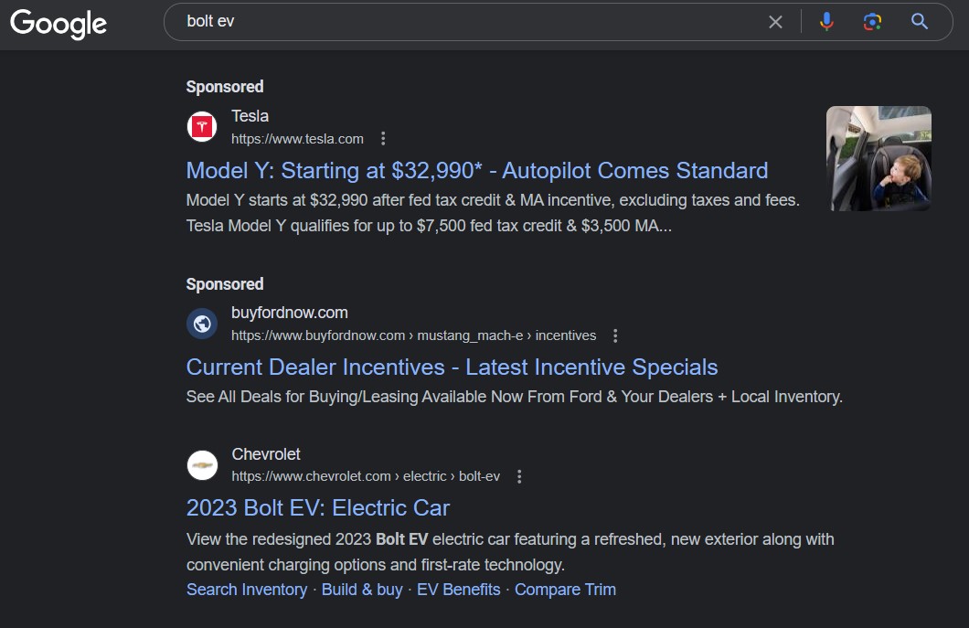 Chevy Bolt EB Google search showing Tesla Model Y ad